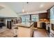 Spacious kitchen with granite countertops, stainless steel appliances, and a central island at 7445 Shoreham Pl, Castle Pines, CO 80108