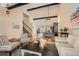 Open-concept living room and dining area with high ceilings and hardwood floors at 7445 Shoreham Pl, Castle Pines, CO 80108