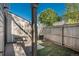 A serene backyard with small patio, fence and a compact air conditioning unit at 8745 Yukon St # 30, Arvada, CO 80005