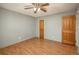 A serene bedroom with hardwood floors, neutral walls, and a ceiling fan at 8745 Yukon St # 30, Arvada, CO 80005