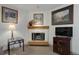 A closer view of the fireplace in the living room at 6380 S Boston St # 111, Greenwood Village, CO 80111