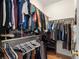 Walk-in closet with double hanging rods, shelving, and visible organization at 10105 Grove Loop # D, Westminster, CO 80031