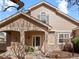 Charming two-story home featuring a cozy front porch and stone accents at 10105 Grove Loop # D, Westminster, CO 80031