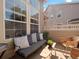 Cozy outdoor patio with comfortable seating and lots of natural light, perfect for relaxing or entertaining at 10105 Grove Loop # D, Westminster, CO 80031
