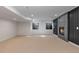 Basement featuring neutral carpet, fireplace with tile surround, and recessed lighting at 9561 Silver Hill Cir, Lone Tree, CO 80124