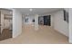 Large basement area with recessed lighting, a cozy fireplace, and access to a tiled bathroom at 9561 Silver Hill Cir, Lone Tree, CO 80124