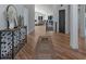 Beautiful foyer with hardwood floors, console table and decor at 9561 Silver Hill Cir, Lone Tree, CO 80124
