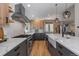 Bright kitchen with stainless steel appliances, lots of counter space, and light-colored wood cabinetry at 9561 Silver Hill Cir, Lone Tree, CO 80124