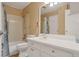 Clean bathroom featuring a well-maintained vanity, toilet, and shower-tub combination with functional fixtures at 14001 E Marina Dr # 607, Aurora, CO 80014