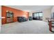 Spacious living room with access to balcony, cozy seating, and stylish decor at 14001 E Marina Dr # 607, Aurora, CO 80014