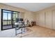 Inviting home office with a large sliding glass door to a deck, ideal for remote work, and ample storage space at 14001 E Marina Dr # 607, Aurora, CO 80014