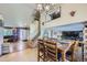 Bright dining area connected to the living room, perfect for entertaining and Gathering meals at 11357 Iola St, Commerce City, CO 80640