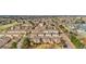 Aerial view of residential neighborhood, townhomes and mature trees at 2925 S Vaughn Way, Aurora, CO 80014