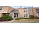 Charming townhome featuring a stucco exterior, well-maintained landscaping, and inviting front entrance at 2925 S Vaughn Way, Aurora, CO 80014