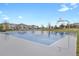 Community basketball court with blue playing surface and well-maintained surrounding landscape at 23615 E 5Th Pl, Aurora, CO 80018