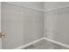 A simple walk-in closet with wire shelving and neutral carpeting for convenient storage at 23615 E 5Th Pl, Aurora, CO 80018