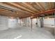 Spacious unfinished basement with high ceilings and open layout, ideal for customization and storage at 5857 S Zante Cir, Aurora, CO 80015