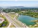 Panoramic aerial view showcasing the landscape with a highway and lake at 11719 W 45Th Pl, Wheat Ridge, CO 80033
