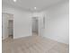 Spacious carpeted bedroom with open doors and ample space at 11719 W 45Th Pl, Wheat Ridge, CO 80033