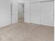 Bedroom featuring plush carpeting and an open layout, ideal for relaxation at 11719 W 45Th Pl, Wheat Ridge, CO 80033