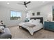 Primary bedroom with large windows and modern decor at 11719 W 45Th Pl, Wheat Ridge, CO 80033