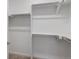 Walk-in closet with shelving and racks, perfect for organizing clothes and accessories at 11719 W 45Th Pl, Wheat Ridge, CO 80033