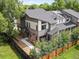 Beautifully landscaped home with manicured yard and charming exterior details at 11719 W 45Th Pl, Wheat Ridge, CO 80033