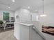Bright hallway with stairs and a built-in workstation and desk space at 11719 W 45Th Pl, Wheat Ridge, CO 80033
