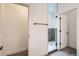 Modern bathroom featuring a glass enclosed shower with a white and gray tiled surround at 10157 W 38Th Ave, Wheat Ridge, CO 80033