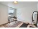 Zen, minimalist bedroom with a big window with views, decor, and room to work out at 10157 W 38Th Ave, Wheat Ridge, CO 80033