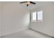 Cozy bedroom featuring a ceiling fan and a window for ample natural light at 10157 W 38Th Ave, Wheat Ridge, CO 80033
