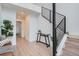 Inviting foyer with a view of the staircase, table and accent decor at 10157 W 38Th Ave, Wheat Ridge, CO 80033