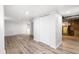 Finished basement with durable flooring, neutral walls, and closet for storage or conversions at 1260 S Emerson St, Denver, CO 80210