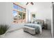 Bright bedroom with large windows, carpet flooring, and a comfortable bed at 1260 S Emerson St, Denver, CO 80210