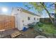 Charming backyard featuring a shed, a grill, and a patio, perfect for outdoor activities and storage at 1711 Spruce St, Denver, CO 80220