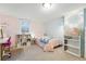 Charming bedroom with whimsical decor, soft pink accents, and playful string lights at 1711 Spruce St, Denver, CO 80220