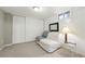 Simple bedroom with ample closet space, soft lighting, and a comfortable futon at 1711 Spruce St, Denver, CO 80220