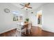 Bright dining room with a ceiling fan, and a nice view of the outdoors at 1711 Spruce St, Denver, CO 80220
