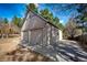 Detached two-car garage with a concrete driveway at 36635 View Ridge Dr, Elizabeth, CO 80107