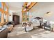 Bright bedroom with large windows and a wooden sleigh bed at 4560 Hilltop Rd, Evergreen, CO 80439