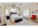Cozy bedroom with high vaulted ceiling, carpet, a ceiling fan, and soft natural light at 9046 Sandpiper Dr, Frederick, CO 80504