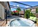 Relaxing hot tub on a lovely backyard patio with privacy fencing and mature trees at 9046 Sandpiper Dr, Frederick, CO 80504