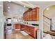 Well-equipped kitchen with granite countertops, stainless steel appliances, and hardwood floors at 9046 Sandpiper Dr, Frederick, CO 80504