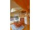 Spacious dining room with log beam construction, second story view, and decorative wall mural at 7076 Boreas Rd, Larkspur, CO 80118
