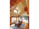 Charming dining room with seating for six, beautiful mural, chandelier, and natural light at 7076 Boreas Rd, Larkspur, CO 80118