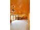 Bright and spacious living area with a second story view and access to the rear deck at 7076 Boreas Rd, Larkspur, CO 80118