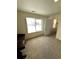 Bright bedroom with a closet and a large window offering natural light at 7435 E 159Th Pl, Thornton, CO 80602