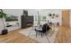 Stylish living room featuring a modern fireplace and sleek, contemporary decor at 1801 W 33Rd Ave, Denver, CO 80211