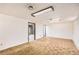 Unfinished basement area with neutral walls and carpet at 726 Mobile St, Aurora, CO 80011