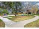 Playground at Apache Mesa Park with walking path and trees at 726 Mobile St, Aurora, CO 80011